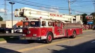 Parade of fire, rescue, and police vehicles in North Aurora, Il