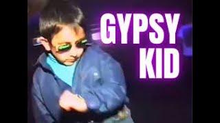 Gypsy kid dancing at club can't be bothered. 1997.