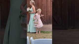 Flower Girl Tries to Shoo Away Annoying Bees at Wedding - 1360422