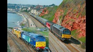 67005 & 67029 on Dawlish Sea Wall on Plextek Charter, 47832 + Stoneblower at Dawlish Warren 20/04/09