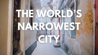 Entering The World's Narrowest City!