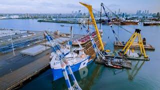 Drone Footage - How a Barge Hull is Unloaded in the Port of Rotterdam