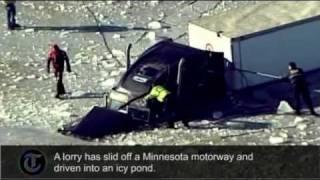 Lorry slides into icy pond in US state of Minnesota