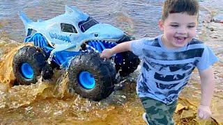 MONSTER TRUCK TOYS in WATER with CALEB & Dad!  Monster Jam MEGALODON STORM All-Terrain RC Truck