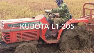 Máy kéo Kubota l1-205 lội bùn lầy.