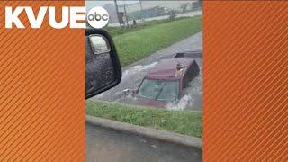 Houston couple rescues person trapped inside truck during floods