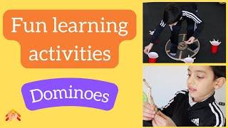 Learning through gross motor play activities [Dominoes]