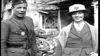 Eleanor Butler Roosevelt with her husband Theodore Roosevelt Jr. at wrecked town...HD Stock Footage