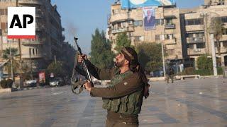 Syrian insurgents inside Aleppo after shock offensive against government troops