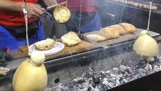 Italy Street Food. Grilling 'Caciocavallo' Cheese, Lamb and Pork Sausages