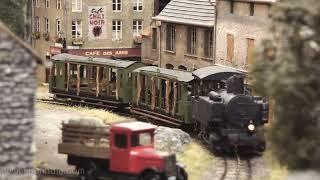 Modelleisenbahn - Ein Miniaturland mit Schmalspur Eisenbahn und Dampflok, wo jeder leben möchte