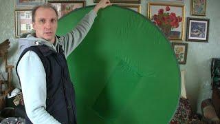 How to fold a round studio photo screen on a metal frame
