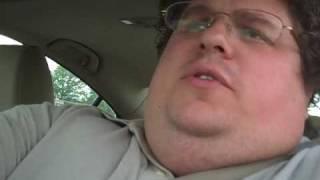 fat guy in stupid car with heavy traffic and fun