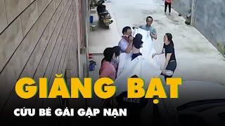 Hàng xóm giăng bạt cứu bé gái gặp nạn ở ban công tầng cao