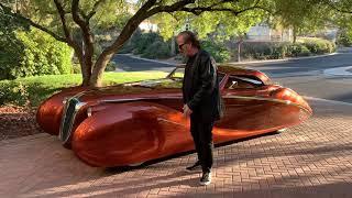 The Illusion, an elegantly curvasious one of a kind coach built vehicle by Rick Dore