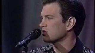 Chris Isaak sings "Solitary Man"