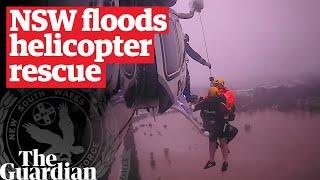 NSW floods: helicopter rescues needed as as flooding moves north