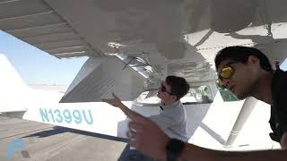 Student Pilot Preflights Airplane