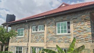 A Black American Builds His Dream Home in Ghana Using Natural Stone Over the Apartment Building