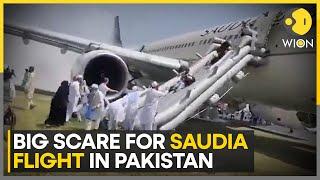 Saudia flight from Riyadh to Peshawar landing gear catches fire | WION