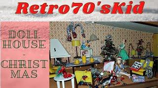 Dollhouses decorated for Christmas