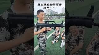 Chinese kid using QBZ-95 Training model in a hilarious way