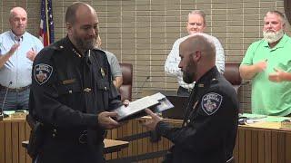 Groves police officer honored with award after saving woman from burning apartment