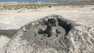 "taking a mud bath" in a mud volcano in Azerbaijan.