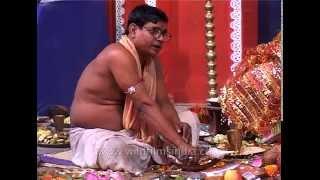 Religious rituals being performed by priests during Durga Puja