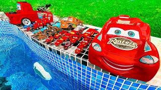 Disney Pixar Cars falling into deep pool, Lightning McQueen, Tow Mater, Mack, Sally, Francesco