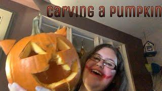 Carving a pumpkin also Happy Halloween| Jessica Maclellan