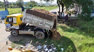 Wonderful Activity Processing Dump Trucks Filling land With D31P KOMATSU Dozer Push to fill the soil