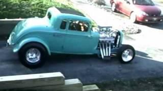 Starting the 33 plymouth street rod and a burnout pt2.wmv