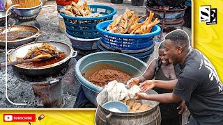 Eating The Most Popular Food In Ghana - Kenkey