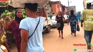 Exploring Yoruba street off new Benin market