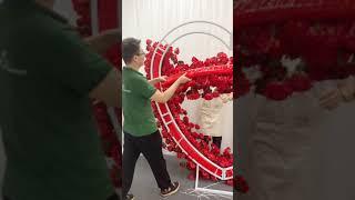 Heart-shaped red rose wedding background decoration#floraldesign #flowerwall #backdrop #diywedding