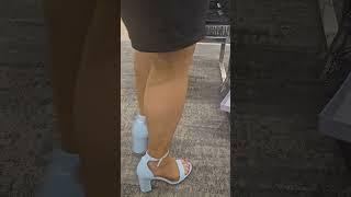 Shoe shopping for baby blue strappy heels with hosiery