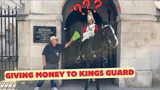 King's Guard Stunned as Tourist Puts Money in his Boots. #kingsguard