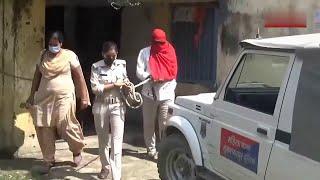 Two Indian policewoman handcuffed and arrested a man.