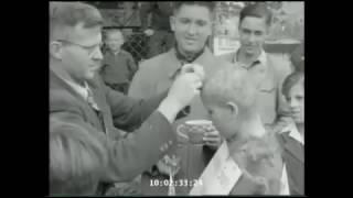 WWII Shocking Footage, German woman shaved by Nazi barber for sexual crimes