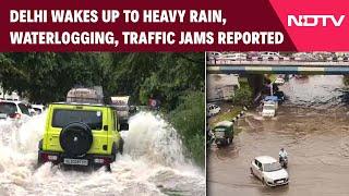 Delhi Rain Today News | Delhi Wakes Up To Heavy Rain. Waterlogging, Traffic Jams Reported