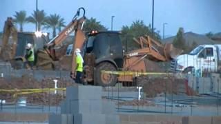 CAT and CASE Loader Backhoes Working on Foundations