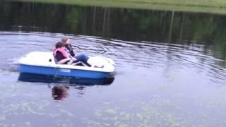 Steering a paddle boat on the lake