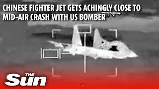 Chinese fighter jet gets achingly close to mid-air CRASH with US bomber in South China Sea