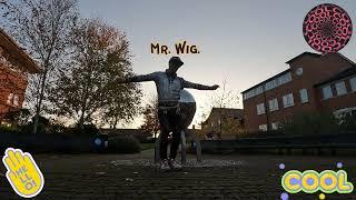 Unravelling the Secret Behind "Mr. Wig" and His Uplifting Dance Steps!
