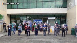 Medical workers clap for fellow frontliners