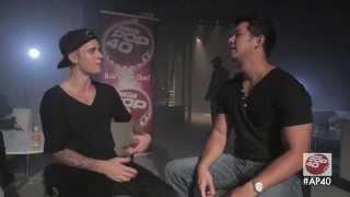 Justin Bieber chats to Dom Lau on Asia Pop 40 backstage in Hong Kong