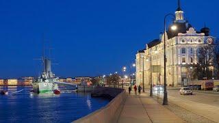  4K Evening illumination of Saint Petersburg. Cruiser Aurora, embankments, historical buildings.