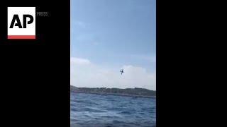 Plane crashes into the sea during an air show in France