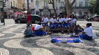 Women drumming in Rossio Square, Lisbon Portugal